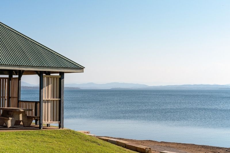 A gazebo near a lake